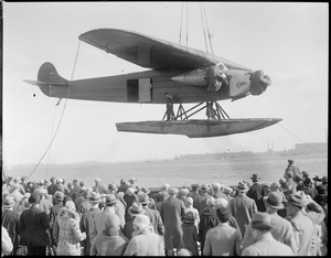 Byrd's South Pole plane being hoisted into water for launch