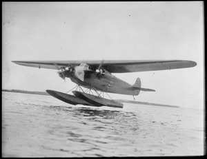 Byrd's South Pole plane taking off from Boston Harbor