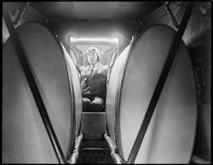 Wilmer Stultz at the wheel of Byrd's Fokker plane that goes to the South Pole