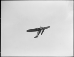 Byrd's South Pole plane on its first test over Boston Harbor, Wilmer Stultz at controls