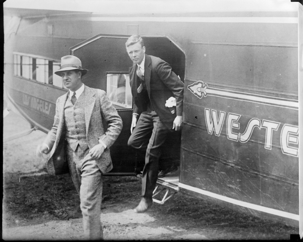 Lindy and Harry Guggenheim leaving New Western Air Express plane - Mitchell  Field, Long Island - Digital Commonwealth
