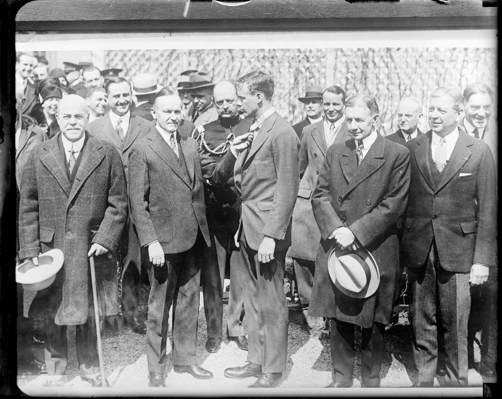 Pres. Coolidge presenting Col. Charles A. Lindbergh with Congressional Medal of Honor at White House (I to R) Speaker Nicholas Longworth, Pres. Coolidge, Col. Lindbergh, Vice Pres. Dawes, Sec. of War Dwight Davis