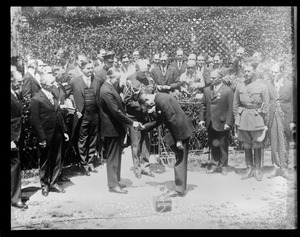 President Coolidge pins cross on Bremen flier Baron von Huenefeld - Washington D.C.