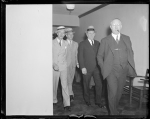 Solomon murder suspects held: Burke in soft hat and Frank Karlonas in straw hat