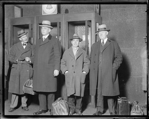 Charles Ponzi after his arrest in Texas after trying to jump to Italy. He is being escorted back to Boston for stay in state prison