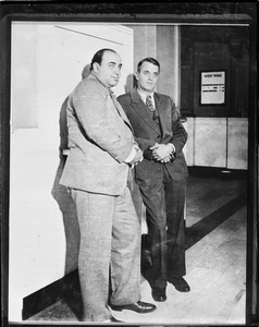 Al Capone and attorney Michael Ahern held for evading income tax