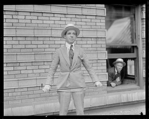 Charles Ponzi with gold handled cane and diamond stickpin