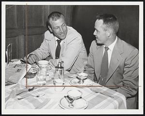 Boston Bound? – Chicago White Sox Catcher Phil Masi (left) discusses the rumors flying that he may change Sox and wind up in Boston with teammate Second Baseman Nelly Fox as they lounged at the Kenmore awaiting tonight’s game with the Yawkeys in the first arc tilt of the season at Fenway Park.