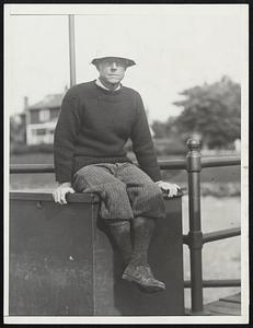 Forgetting cares of state, Charles Francis Adams, secretary of the navy, appears in an informal pose at Marblehead, Mass., after participating in yacht races there.