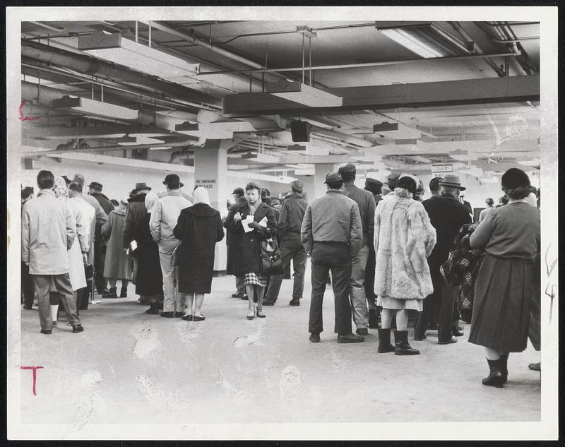 Jobless lineup today at the Stuart St. claims office of the State Division of Employment Security. Massachusetts rate of unemployment has reached the second highest level of the decade.