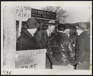 East Douglas, Mass. – Mill President Talks With strikers – President Winfield A. Schuster, second from left, of Hayward-Schuster Wollen Mills talks with pickets outside the mill this morning. 500 employees went on strike today.