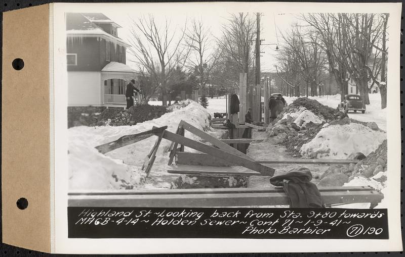 Contract No. 71, WPA Sewer Construction, Holden, Highland Street, looking back from Sta. 9+80 towards manhole 6B-4-14, Holden Sewer, Holden, Mass., Jan. 9, 1941