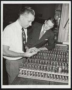 Locks For Public Lockers. Some of the 5,000 locks that are changed daily in New York City's public lockers are given a final inspection by Robert Stewart, left, serviceman, and Fred G. Smith, district manager... If a locker isn't emptied after 24 hours of use, its contents are removed, the bin is sealed for three days, and the lock is changed before it's put back into service.