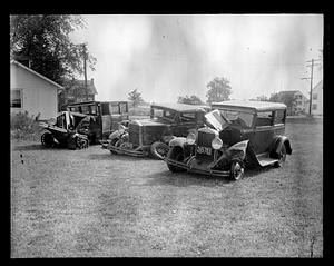 Three damaged cars