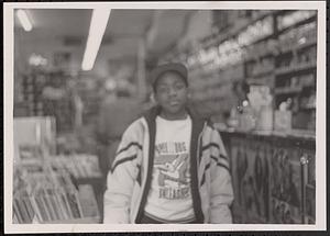 Young man in a record store