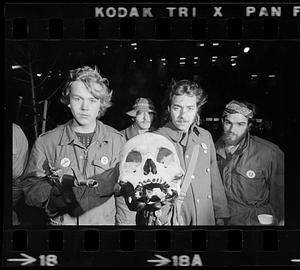 Anti-war demonstrators with human skull, Government Center