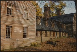 View of long wooden building in the fall