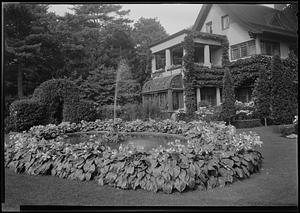 Fountain and funkia bordered pool in Mrs. F.M. Whitehouse garden, N.W.