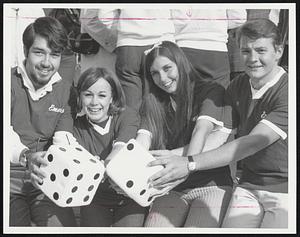 The ‘Parcheesi In’ at the Common Saturday saw Emerson College win its opening match. From left, Herb Holmes, Siri Odhner, Christine Carlsen and Ed Stetina.