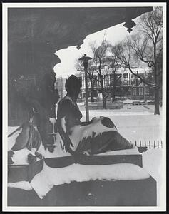 State House Viewed by Snow Covered Statue
