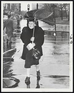 Oops! - That wind proved a direct ally of the umbrella repair men, as witness this accident in the course of happening downtown today.