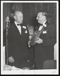 Ratheon Totem Pole Ballroom Annual Achievement Award. LtR Charles Francis Adams Jr. receives award from Murray E. Sholkin, Past Pres.