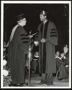 Allegheny College. President Lawrence L. Pelletier (left) and William F. (Bill) Russell as the latter received his honorary degree.
