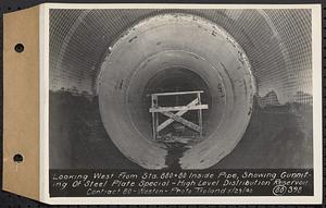 Contract No. 80, High Level Distribution Reservoir, Weston, looking west from Sta. 880+80 inside pipe, showing gunniting of steel plate special, high level distribution reservoir, Weston, Mass., May 29, 1940