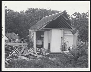 Destruction at West Dennis included this little cottage which was torn apart by wind.