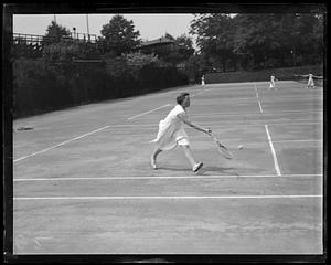 A woman playing tennis
