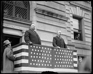 William H. Taft stands next to an unidentified man