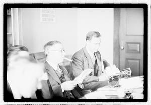 Group of men at table