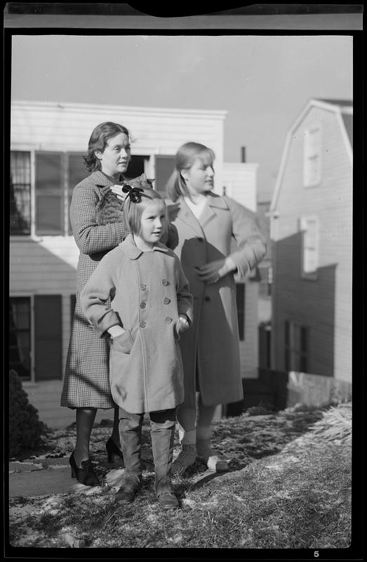 Two women and one child outdoors