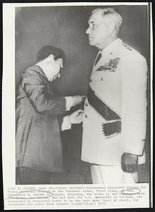 Abrams Honored--Vietnamese President Nguyen Van Thieu presents the sash of the National Order, First Class, to Gen. Creighton W. Abrams in Saigon, Thursday. The order is the country's highest honor. Gen. Abrams, who has been the U.S. commander in Vietnam, was nominated by President Nixon to be the next Army Chief of Staff.