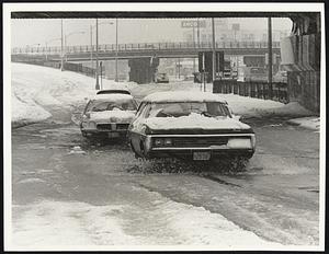 Flooding on Frontage Rd. So Berkley St Exit No. Bound. Weather Snow