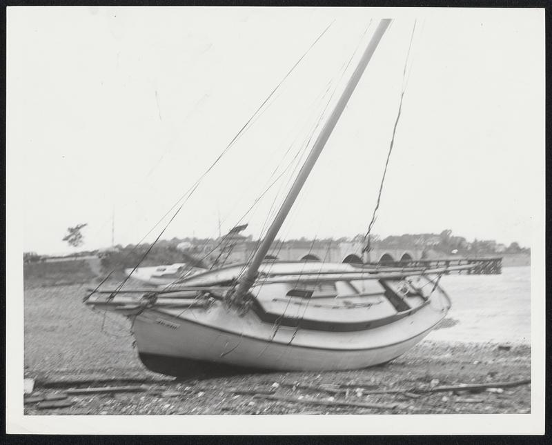 Boat on beach following storm