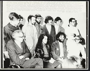 The trial of the Chicago 15 was postponed 5/4 when only 10 of the group showed up for the opening of the trial. Nine of the defendants are pictured with their advisors at a 5/4 news conference after postponement. (L-R seated) Richard Criley, an advisor; Linda Quint, 22, Chicago; Lee Weiner, an advisor; Edward Gargan, 19, Milwaukee. (L-R standing) Margaret Katroscik, 23, Detroit; Rev. Nicholas Ridell, 40, Milwaukee; Charles Muse, 21, Roxbury, Mass.; Charles Fullenkamp, 21, Burbank, S. Dak.; William Durkin, 20, Milwaukee; William Sweeney, 20, Milwaukee; Joseph Mulligan, 27, Aurora, Ill., a Jesuit seminarian. The 15 are charged with destroying draft records at a south side Selective Service office last 5/25.