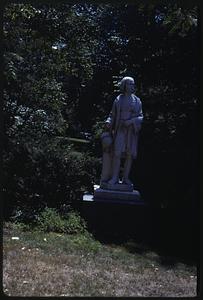 A statue in shadow