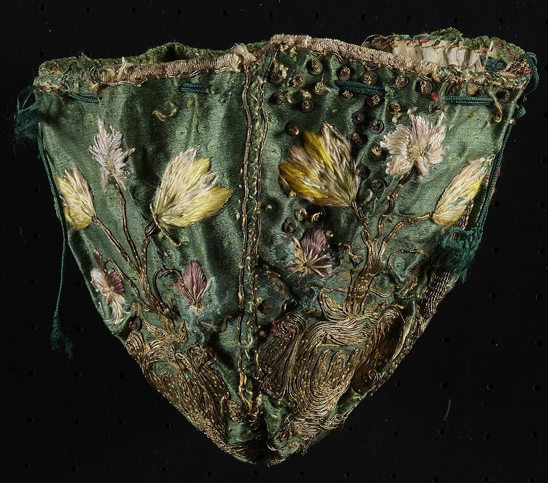 17th-century embroidered silk purse stabilized with fragments of medieval manuscript waste