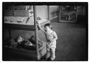 Girl looking at exhibits, Museum of Fine Arts