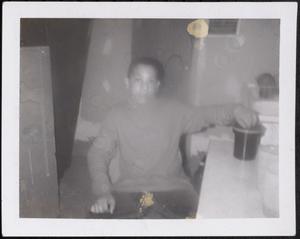 Boy sitting in a chair