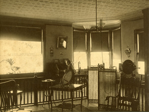 Charles Eugene Monroe in his first optometry office in Southbridge Massachusetts