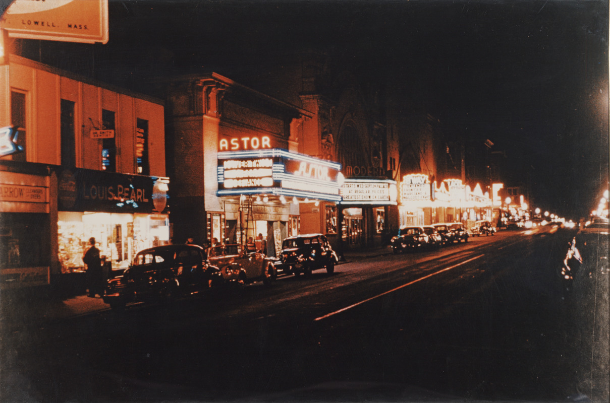 Four movie theaters that were located on Broadway in Lawrence, Mass. at night
