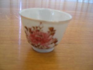 Japanese red and brown painted porcelain sake cup