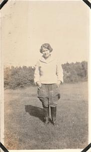 Alma Trulson standing in a field