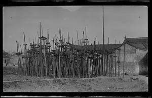 Degree poles outside a family ancestral hall in Nanking