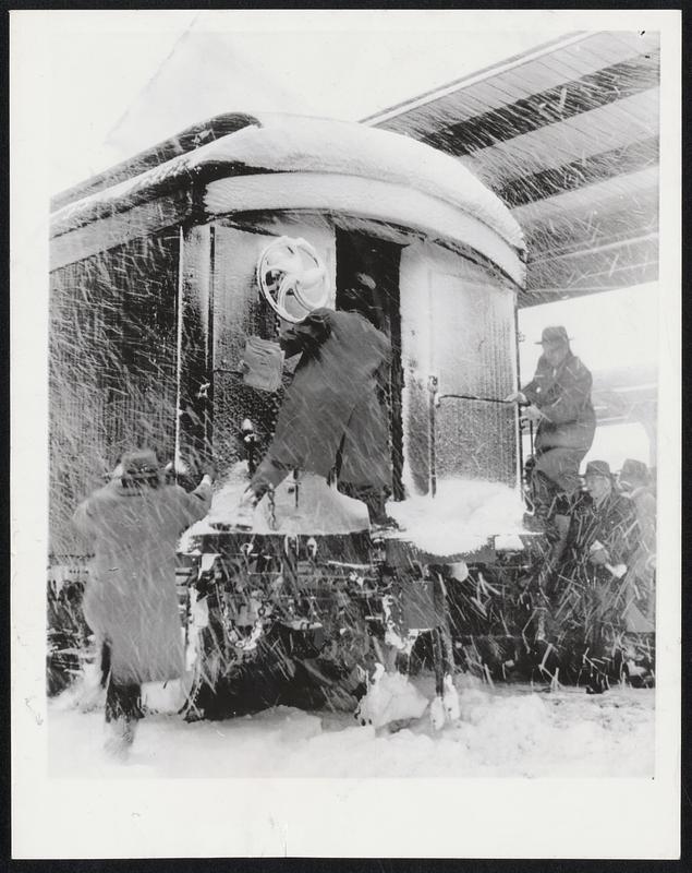 Blizzard II hit Boston with a wallop and it was first come first on at the South Station, above. Commuters didn't even bother to use the steps and climbed on anyway.