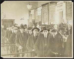 Hundreds Desert War Work to Obtain Permanent Jobs. Signing up for jobs at the office of the United States employment service, 55 Canal street. Now that the war is over, there is a big rush of men anxious to secure permanent positions in lines of work which will be continued during times of peace.