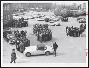 Groups of non-union supervisory employes wait outside main gates of Quincy shipyard today just before management sent them home with orders to return tomorrow. There were reports management would order them to pass through picket lines manned by 150 strikers. Some 75 policemen stood by.