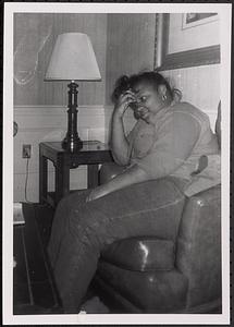 Young woman sitting in a chair